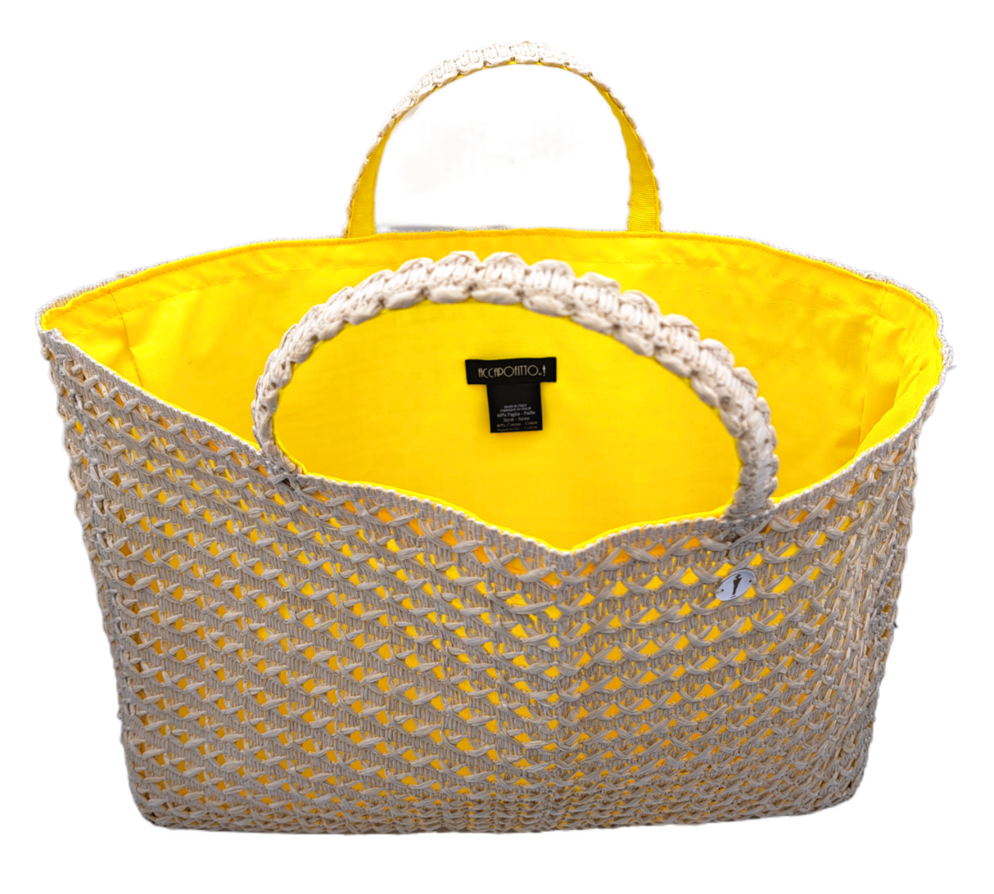 Borsa in rafia di viscosa con lavorazione a intreccio del brand Accapofitto, collezione GoldenHay, rivestita internamente con tessuto di cotone giallo. Visione dell'interno.